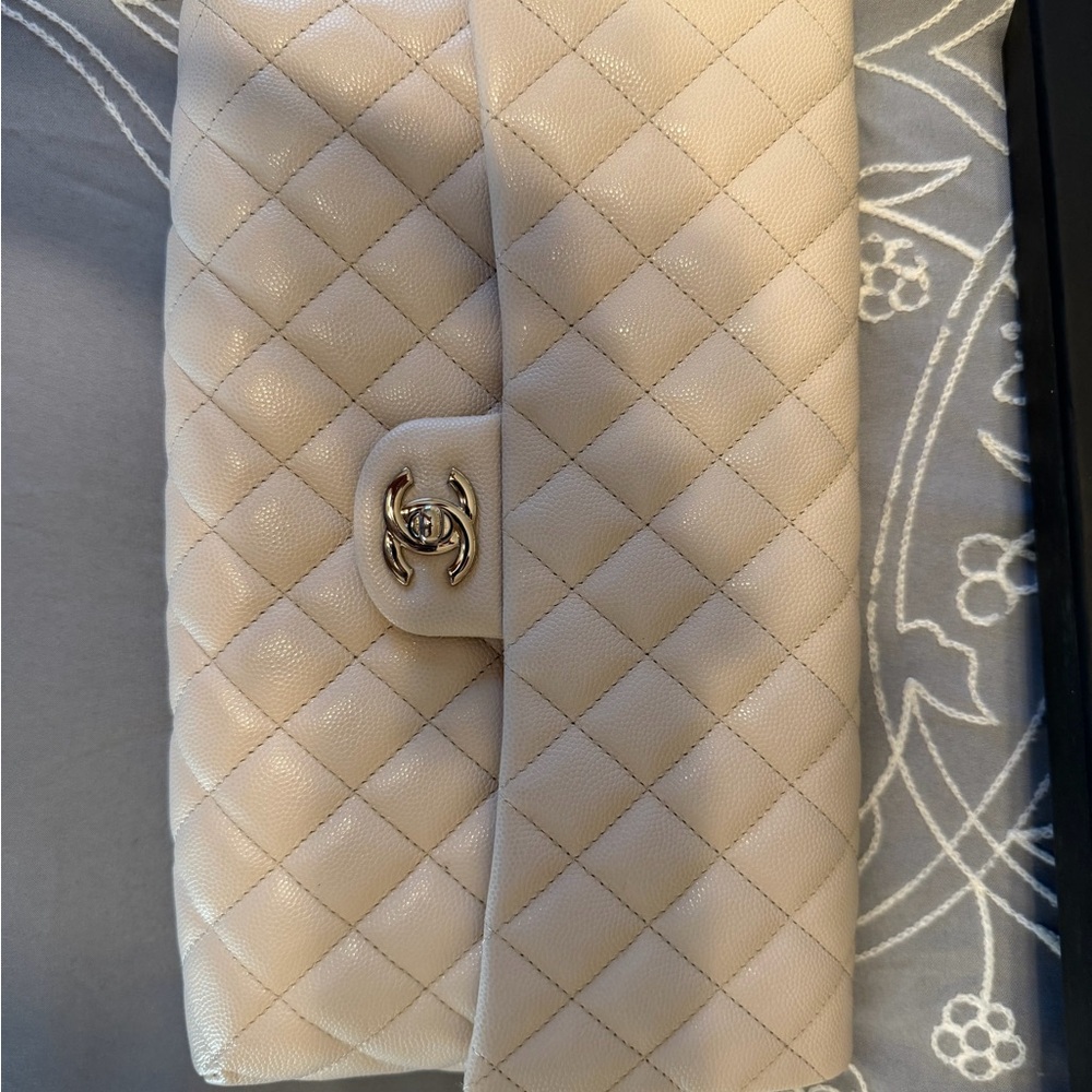 CHANEL Beige Quilted Clutch